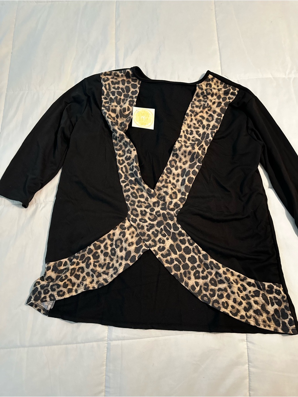 Black Top with Leopard Accent Cut Out Back